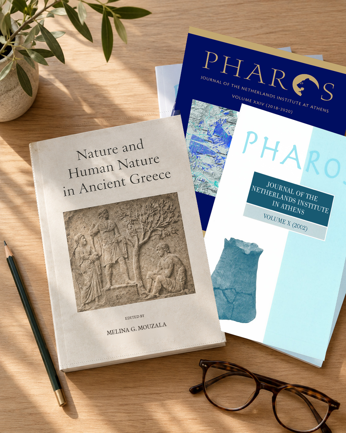 Volume X of Publications of the NIA on a table beside issues of Pharos